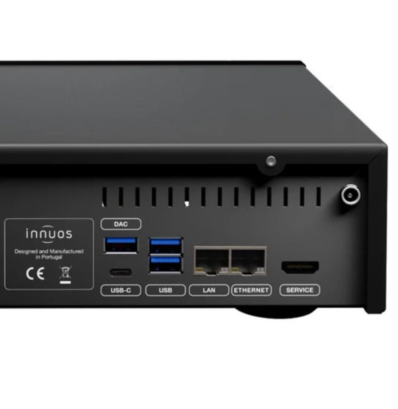 Back panel of a black network device showing USB-C, USB, LAN, Ethernet, and service ports.