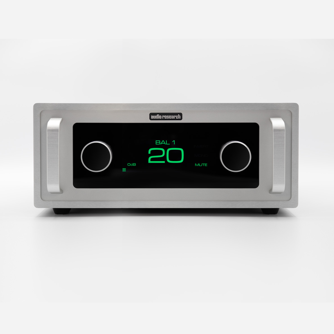 Front view of a silver audio receiver with a black panel, green LED readout showing '20' and balance indicators, and two large knobs on either side.
